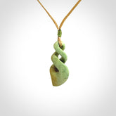 A gorgeous little twist pendant carved in New Zealand Jade