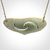Hand carved whale tail pendant in New Zealand Jade