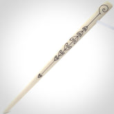 Hand carved bone hair pin with double sided koru design.