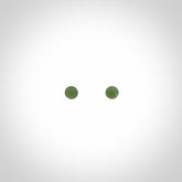 Hand carved small New Zealand Jade and Sterling Silver stud earrings.