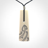 Hand carved bone toki pendant