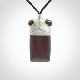 This is a beautiful hand carved Red Jasper Stone toki pendant. A really cool piece that is made from this rare and beautiful material. The red jasper has a very distinctive look and each piece is different. We ship this worldwide and the cost of shipping is included in the price. Provided with adjustable cords and packaged in a woven kete pouch.