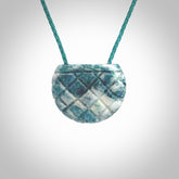 This is a handcrafted aotea stone pendant. This is a solid little work of art. We ship this worldwide for free and are happy to answer any questions that you may have about these or other products on our website.