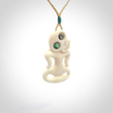 This little bone tiki has been carved to look and feel great. It has pāua shell eyes and is provided with an adjustable cord. A gorgeous and small traditional piece that is great for children.