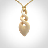 Hand carved woolly mammoth tusk twist pendant. Made by NZ Pacific.