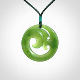 This pendant is a complex koru design. Carved in gorgeous New Zealand jade it is a medium sized pendant that can be worn by anyone. Hand made in New Zealand by NZ Pacific.