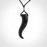 Black jade Italian Horn pendant. Handmade jade jewellery made by NZ Pacific and for sale online. Black Jade Goat Horn pendant worn for protection over evil eye, bad luck and promotes fertility. Ancient symbolic necklace hand made in Australian Black Jade.