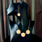 Hand made woolly mammoth tusk triple drop necklace with Sterling Silver and matching earrings.