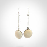 Hand made woolly mammoth tusk earrings. Made by NZ Pacific and sale online only.