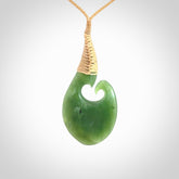 This koru is carved from a very striking New Zealand jade.