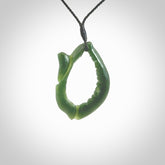 Hand carved contemporary jade broken sea shell jewellery. Made by Donna Summers for NZ Pacific from New Zealand greenstone. Authentic jade jewellery for sale online. These are a beautiful and feminine necklace and would make the perfect gift for the women in your life.