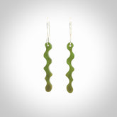 Hand carved New Zealand jade snake earrings. One only Jade and sterling silver snake earrings.
