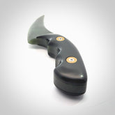 Hand made Jade knife with inset cartridge heads. Carved from a lovely piece of local New Zealand Jade. The quality of the workmanship and design is outstanding - this is a gorgeous display piece.