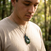 Man wearing a jade hook