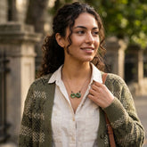 Woman wearing jade eternity pendant