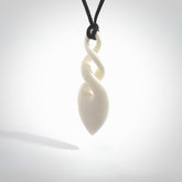 Hand carved bone double twist pendant. Beautiful hand made double twist bone necklace. Provided with an adjustable cord and packaged in a woven kete pouch. Free shipping worldwide.