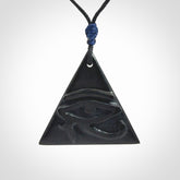 An Egyptian Eye of Horus pyramid pendant, hand made for us from Australian Black Jade. This pendant is provided with an adjustable black cord.