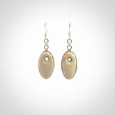 Hand carved woolly mammoth tusk earrings. Hand made by NZ Pacific for sale online.