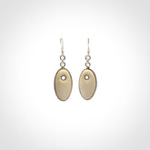 Hand carved woolly mammoth tusk earrings. Hand made by NZ Pacific for sale online.