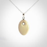 Hand carved woolly mammoth tusk pendant