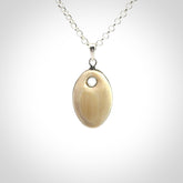 Hand carved woolly mammoth tusk pendant