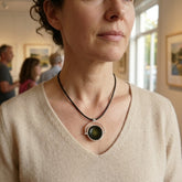 Woman wearing jade and silver pendant