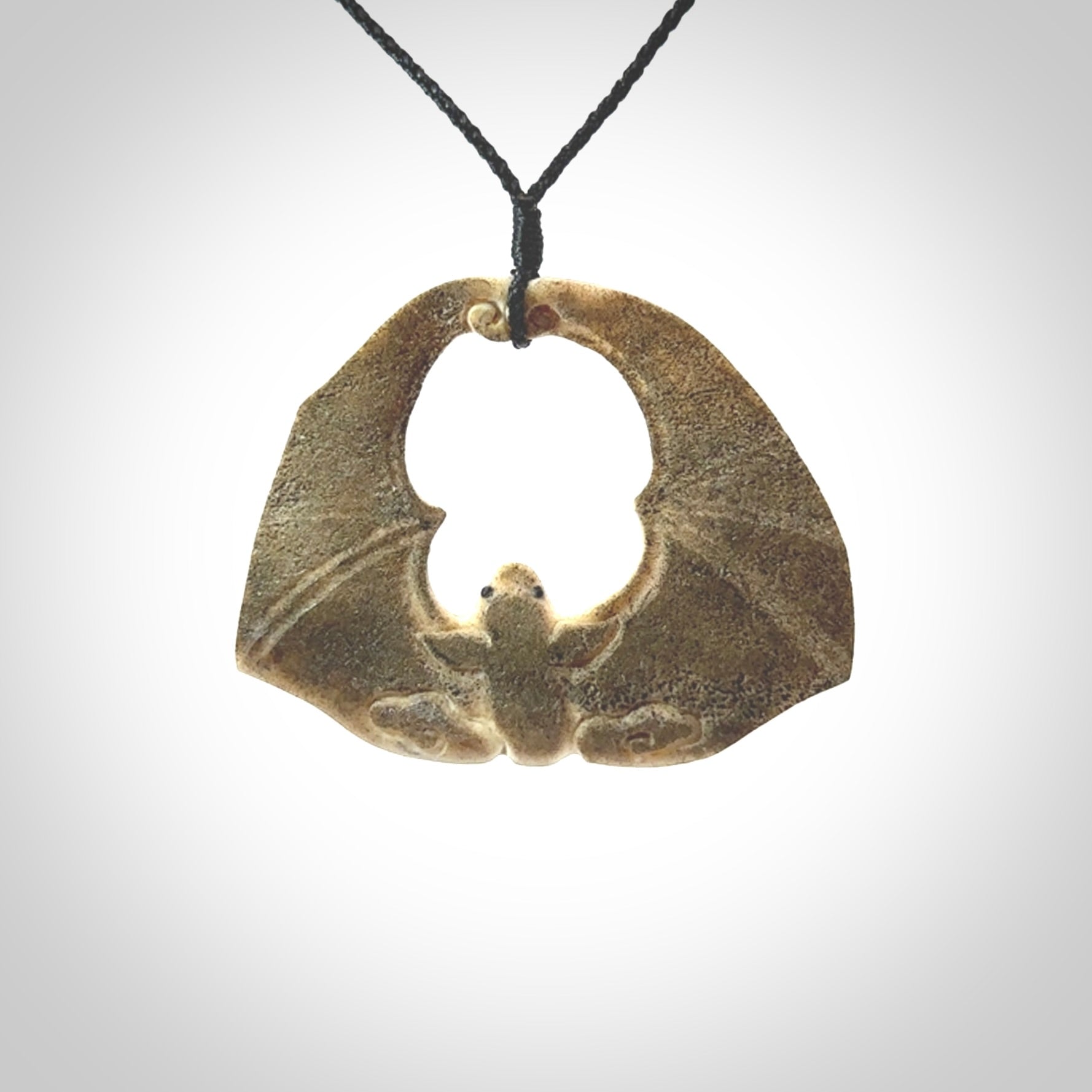 Hand carved bat Pendant. Made from Deer antler in New Zealand. Unique bat necklace hand made from deer antler by master bone carver Fumio Noguchi. Spectacular collectable work of art, made to wear. One only pendant, delivered to you with express courier.