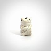 Hand carved meditating frog with slug on its head, made from Deer antler and black mother of pearl. Hand made by master bone carver Fumio Noguchi. Spectacular collectable work of art to display. One only, delivered to you at no extra cost with express courier.