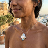 Woman wearing Mother of Pearl pendant