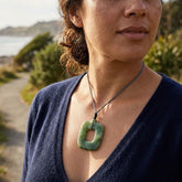 Woman wearing jade pendant