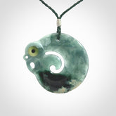 Guatemalan Jadeite Koru Manaia pendant. Made in New Zealand. Real Jade, pounamu. Real New Zealand Jade Manaia with Koru necklace with a polished finish.