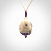Hand carved mammoth tusk goddess pendant. Hand carved Mammoth Tusk jewellery for sale online by NZ Pacific. Delivered with a fine adjustable cord and packaged in a woven kete pouch.