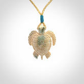 This is a beautiful hand carved woolly mammoth tusk turtle pendant. A really cool piece that is made from this rare and beautiful material. The mammoth has a very distinctive grain and each piece is different. We ship this worldwide and the cost of shipping is included in the price.