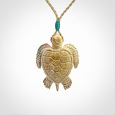 This is a beautiful hand carved woolly mammoth tusk turtle pendant. A really cool piece that is made from this rare and beautiful material. The mammoth has a very distinctive grain and each piece is different. We ship this worldwide and the cost of shipping is included in the price.