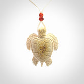 This is a beautiful hand carved woolly mammoth tusk turtle pendant. A really cool piece that is made from this rare and beautiful material. The mammoth has a very distinctive grain and each piece is different. We ship this worldwide and the cost of shipping is included in the price.