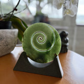 Hand carved large New Zealand Inanga Jade Koru with Greywacke stand sculpture. Hand carved here in New Zealand by Ric Moor. This is a 'one only' sculpture, a beautiful display piece.