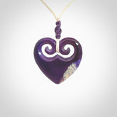 Hand carved heart pendant. Hand made from woolly mammoth tusk. Hand made jewellery for sale online. Rare and unique handmade jewellery. Made by NZ Pacific.