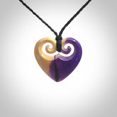 Hand carved heart pendant. Hand made from woolly mammoth tusk. Hand made jewellery for sale online. Rare and unique handmade jewellery. Made by NZ Pacific.