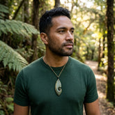 Man wearing Jade koru pendant