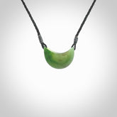 Hand carved jade kete pendant. Kete hand made in British Columbian Jade with adjustable cord. Delivered with Express Courier.