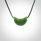 Hand carved jade kete pendant. Kete hand made in British Columbian Jade with adjustable cord. Delivered with Express Courier.
