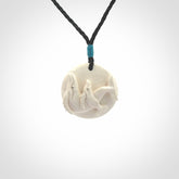 Hand carved woolly mammoth tusk whale pendant