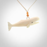Hand carved bone contemporary sperm whale pendant. Hand carved by NZ Pacific. Free postage worldwide. Hand made whale necklace from bone. Ocean themed necklace for men and women.