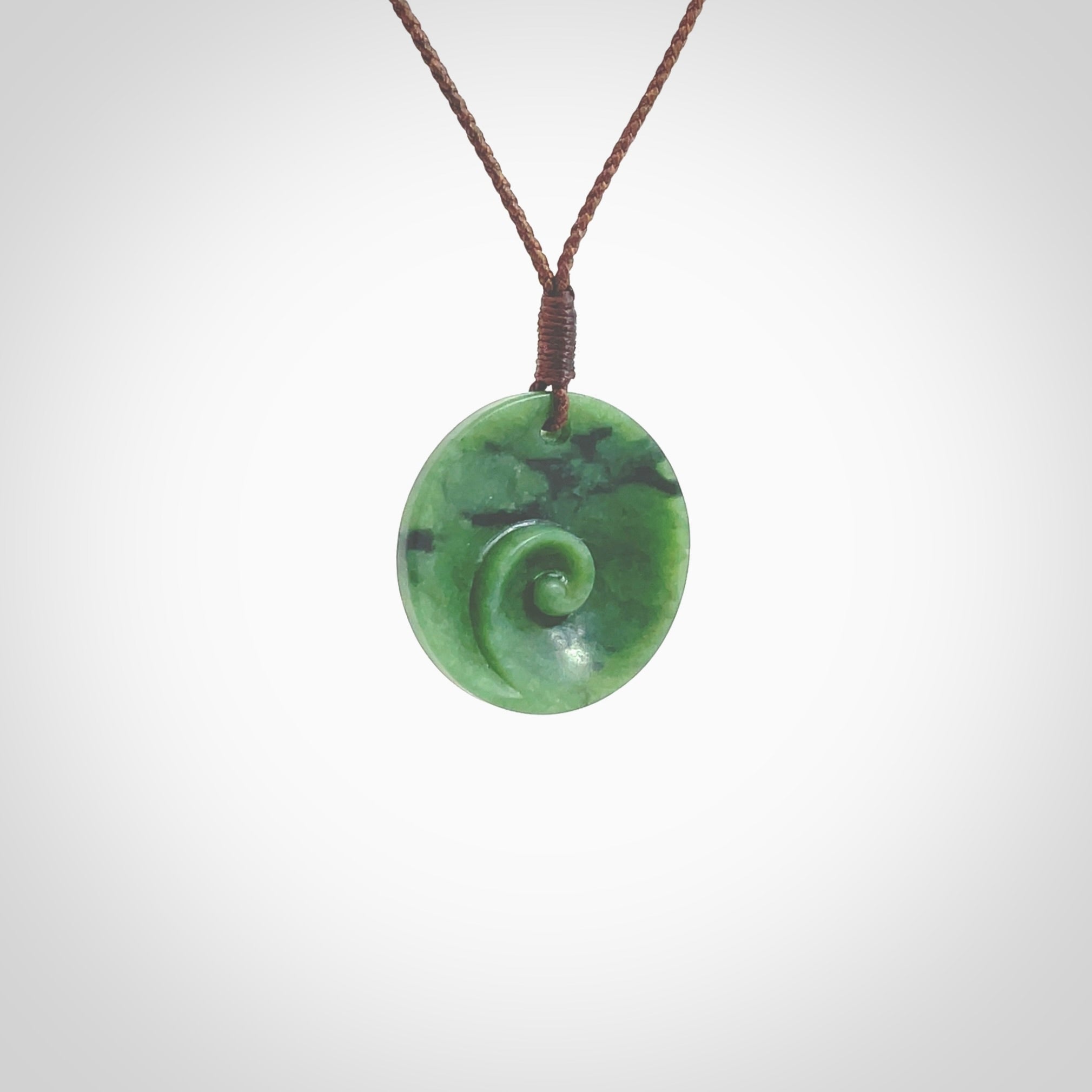 HAND CARVED SMALL NEW ZEALAND JADE KORU CUPPED KORU