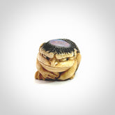 Hand carved incredible Kappa holding cucumber carving in deer antler with paua shell and buffalo horn. A one off collectors item that has been hand crafted to be displayed.