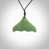 Hand carved small New Zealand Jade whale tail pendant. Carved for NZ Pacific. Handmade ocean themed jewellery for sale online. Hand made by Kyohei Noguchi.