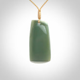 This is a lovely New Zealand Inanga Jade, pounamu Toki drop pendant. Hand carved for us by Kyohei Noguchi. It is bound with an adjustable beige coloured cord which is length adjustable. Free worldwide shipping.