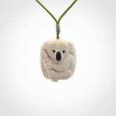 Hand carved woolly mammoth tusk koala bear pendant