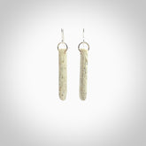 Hand carved medium whalebone drop earrings hand made by Kristal Thompson. One only whale bone drop earrings. Real whale bone art to wear. Free Shipping worldwide. One pair only, delivered in a kete pouch.