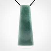 Hand carved large Guatemalan Jadeite Toki pendant.